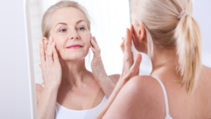 Women in mirror, wondering if collagen really works